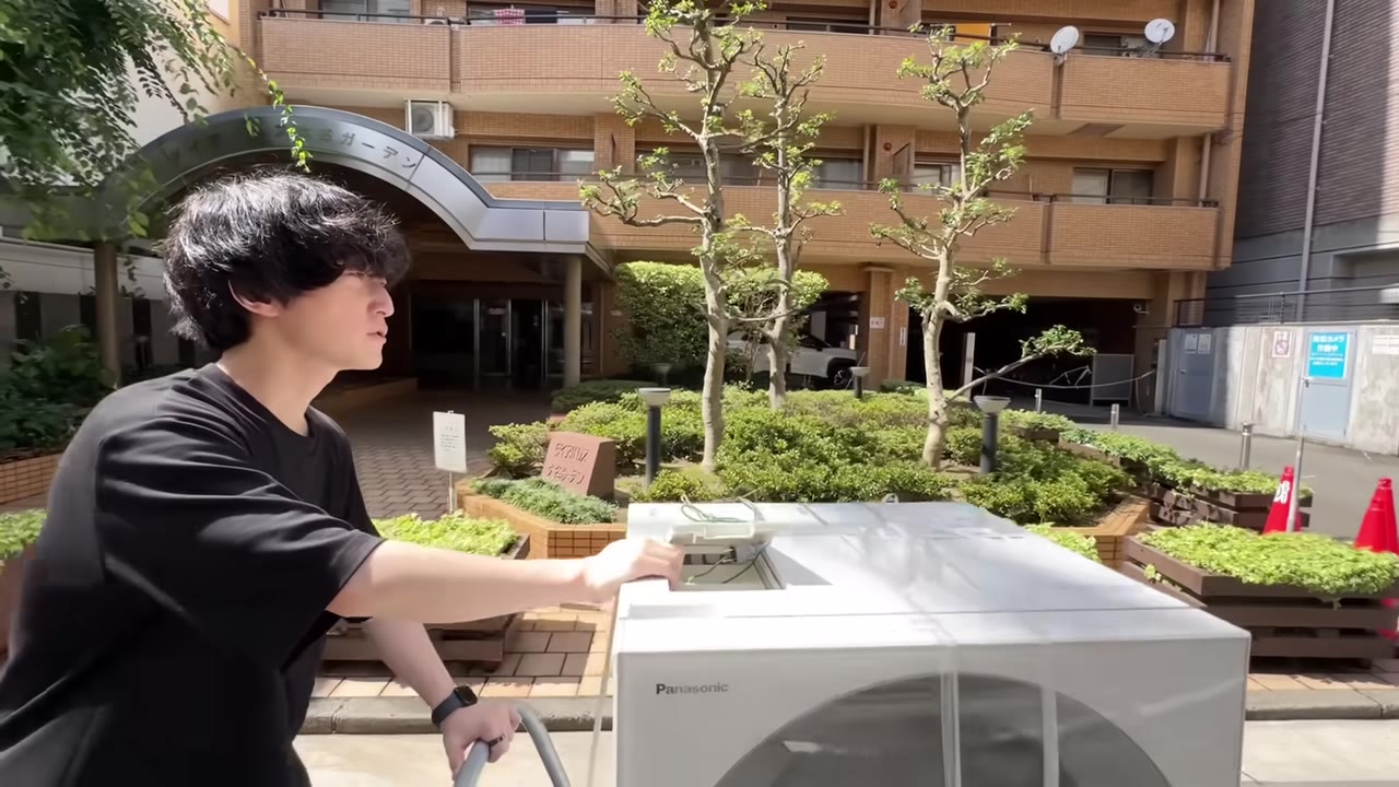 ドラム式洗濯機を台車に載せて運ぶ